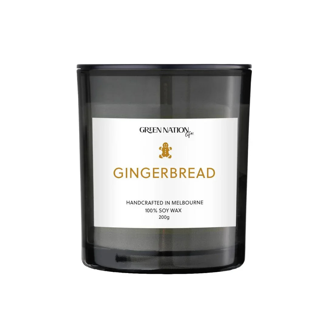 Green Nation Life gingerbread soy wax candle in black jar with white label