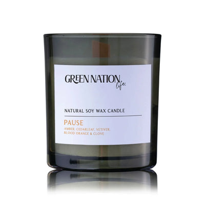 Green Nation Life Pause natural soy wax candle in a dark glass jar