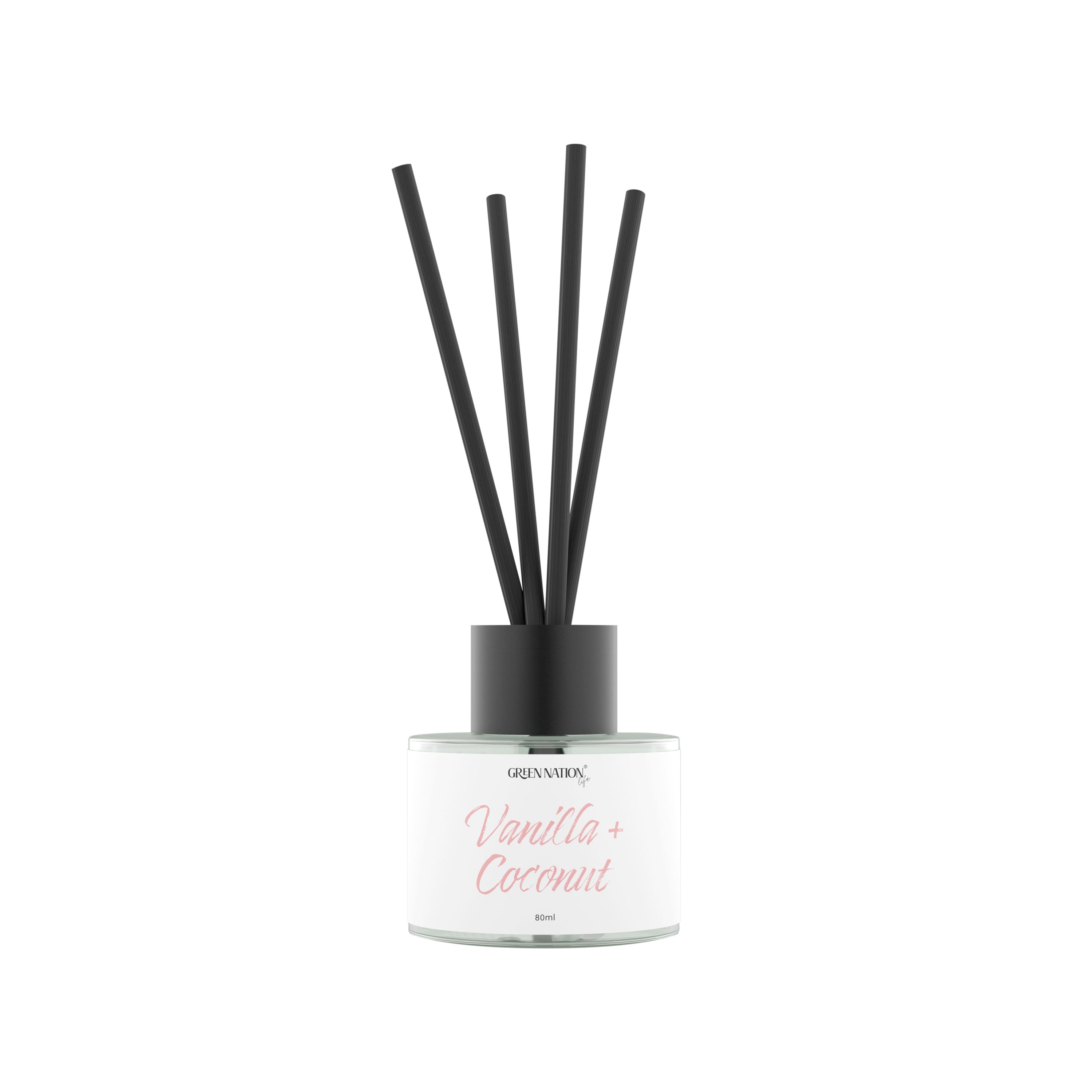 Vanilla coconut reed diffuser in clear glass bottle with black sticks on white background